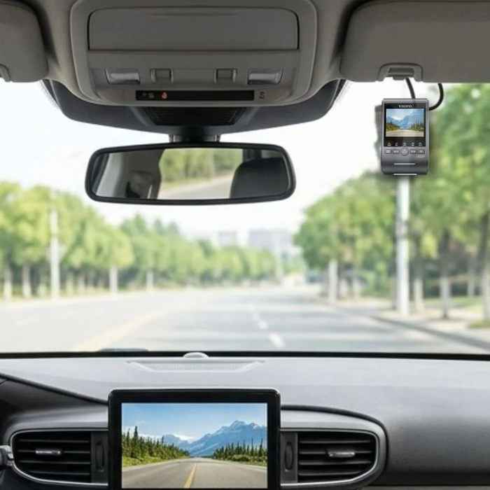 Wide windshield view with a VIOFO dash cam installed for front road recording