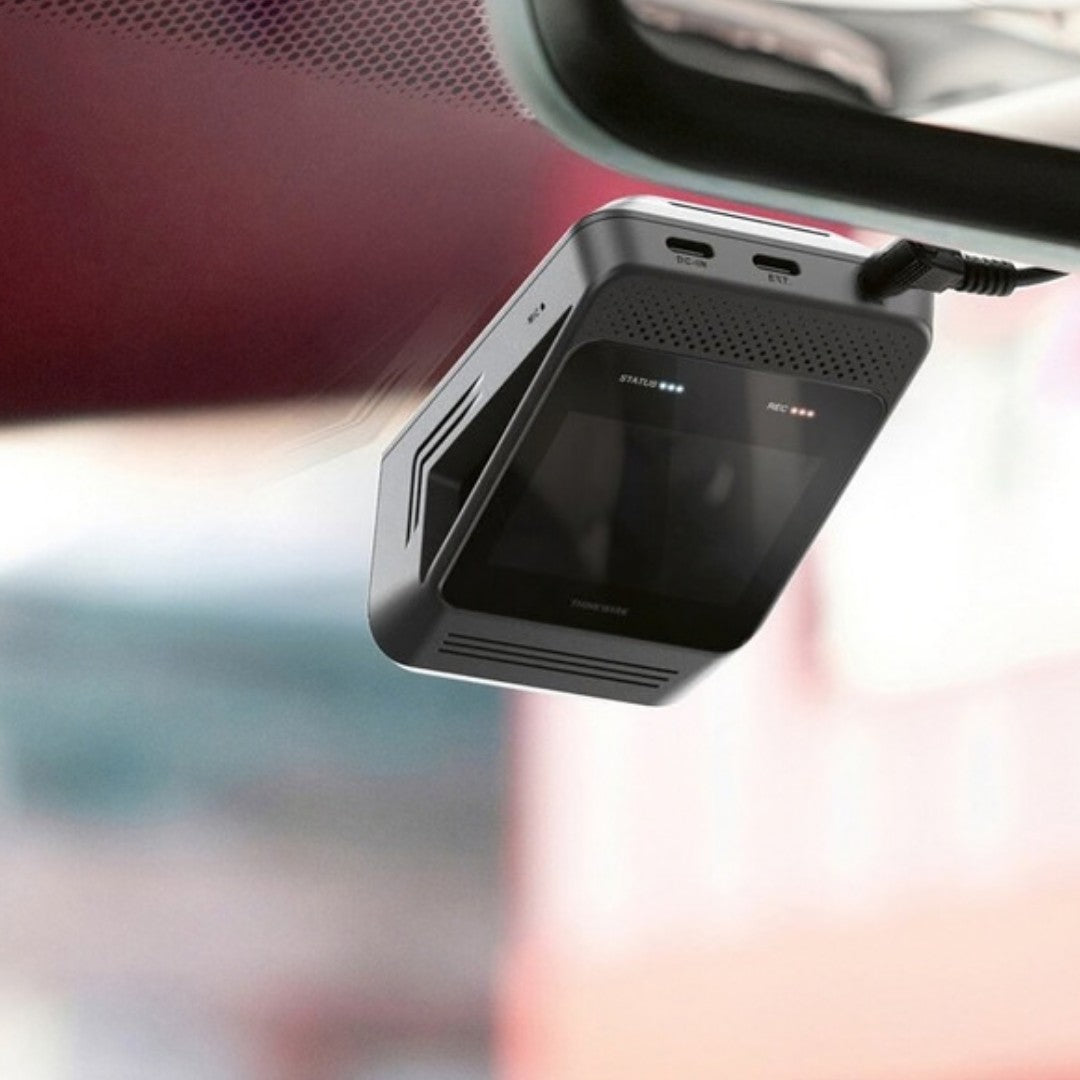 Thinkware ARC 800 touchscreen installed beside a rearview mirror