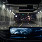 BlackVue camera beneath the rear-view mirror during night driving